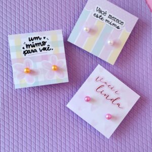 Tag com brinco pérola